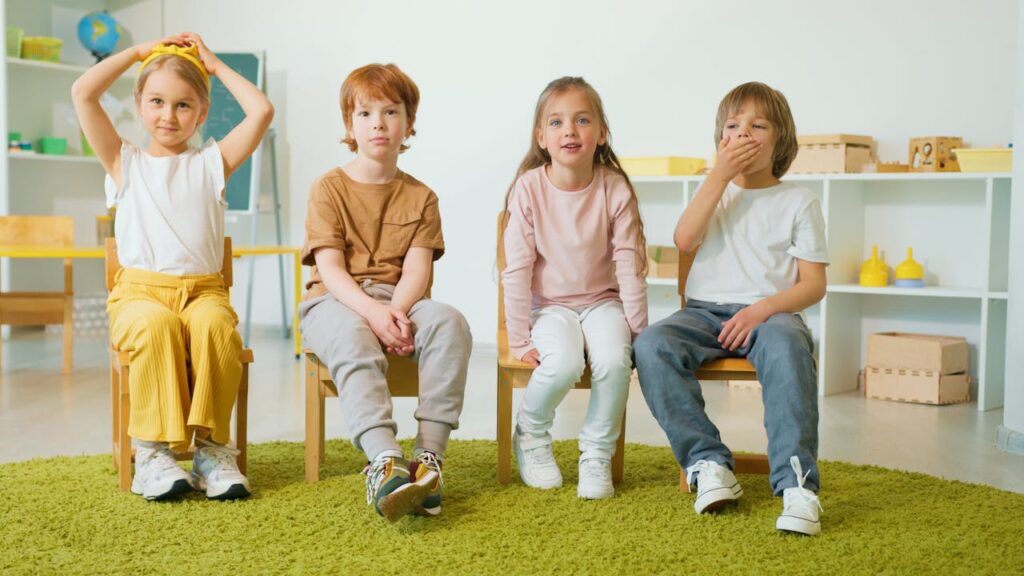 about Compassionate Family Care 

Group of children sitting on chairs in a classroom, smiling and engaged.